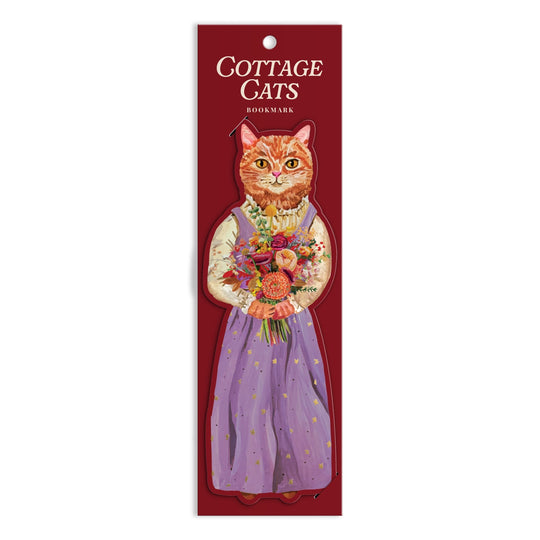The Cottage Cats Paper Bookmark by Anja Riebensahm features an illustrated orange cat in a purple dress holding flowers, with "Cottage Cats Bookmark" text on a red background at the top.
