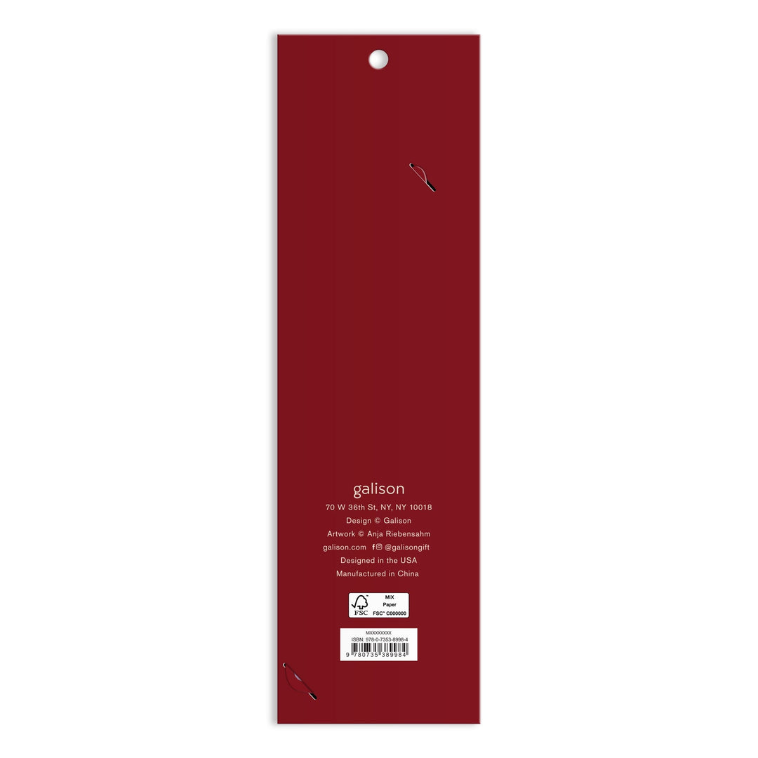 The image shows the back of a tall, rectangular, dark red Cottage Cats Paper Bookmark package by Anja Riebensahm with white text displaying company info, a New York address, manufacturing details, and a small recycling symbol at the bottom.