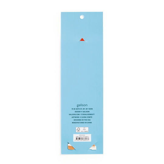A rectangular blue package for the Seasons Tweetings Paper Bookmark by Éléna Comte, featuring a small orange triangle at the top and white text with manufacturer and contact info on a plain white background. Perfect for festive gifting.