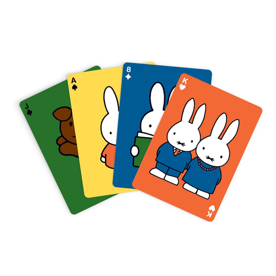 The Miffy Playing Card Deck by Miffy features four illustrated cards: a green Jack of clubs with a brown dog, a yellow Ace of spades with a white bunny, a blue 8 of diamonds and an orange King of hearts—each with two white bunnies.