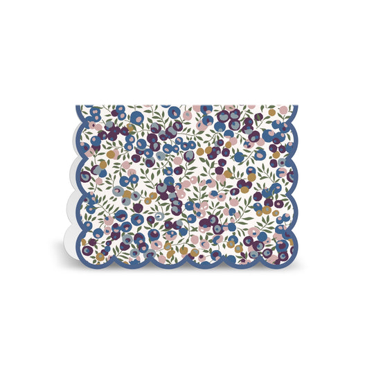 The Liberty Premium Notecard Set by Liberty London features floral-patterned notecards with blue, purple, and pink flowers, green leaves, and a blue scalloped border, shown upright against a white background.