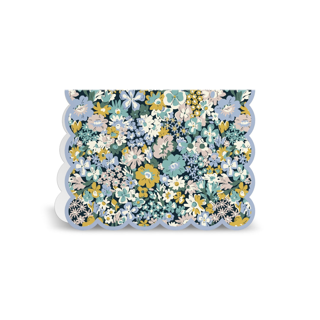 The Liberty Premium Notecard Set by Liberty London features greeting cards with scalloped edges and a vibrant floral pattern in blue, yellow, green, and white on a crisp white background.