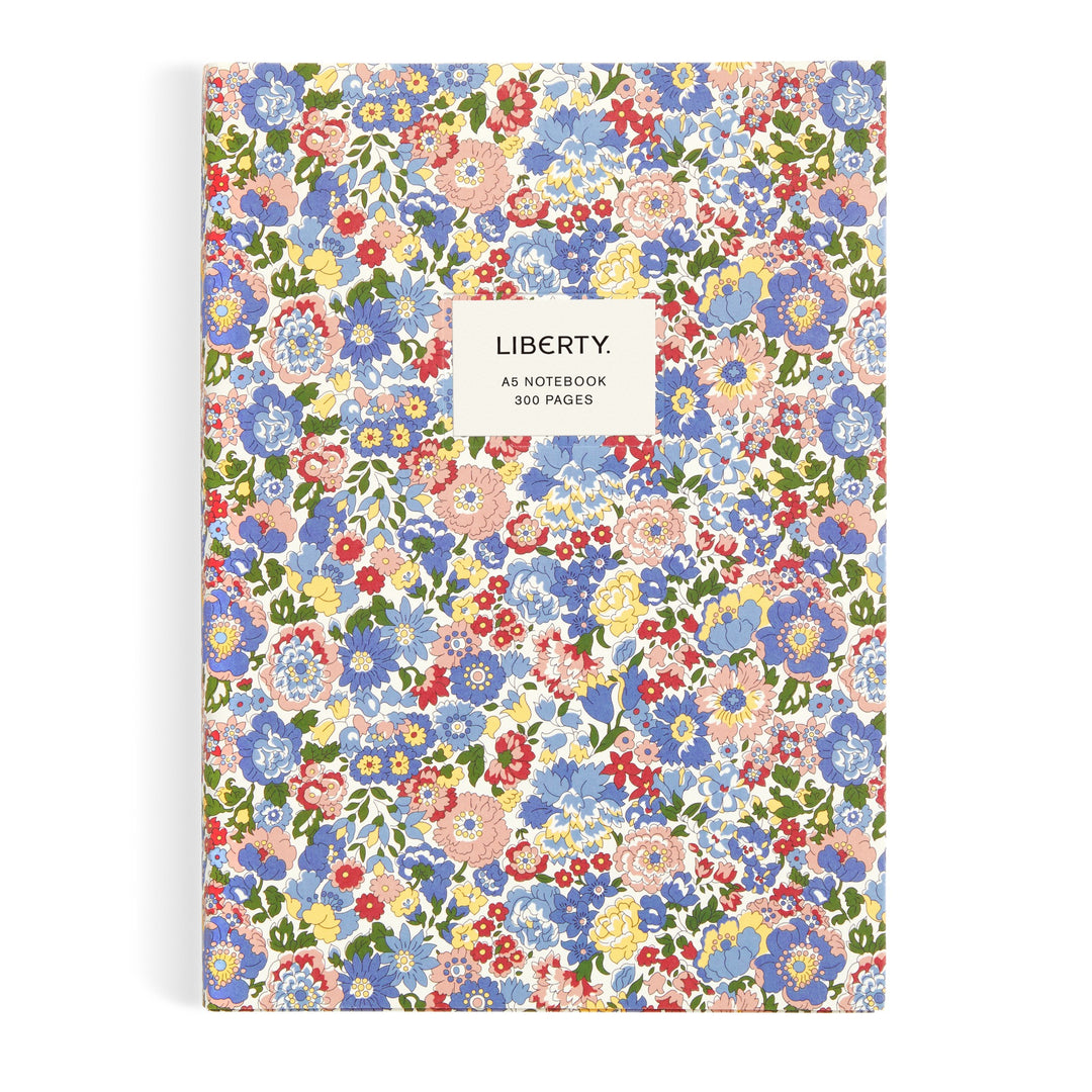 The Liberty Nell, Annie and May Premium A5 Notebook from Liberty London features a vibrant floral cover and centered “LIBERTY. A5 NOTEBOOK 300 PAGES” label—ideal for fans of signature Liberty London style.