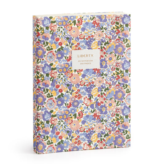 The Liberty London Nell, Annie and May Premium A5 Notebook features a vibrant floral pattern in pink, purple, red, and yellow, with a front label reading Liberty London A5 Notebook 300 Pages.
