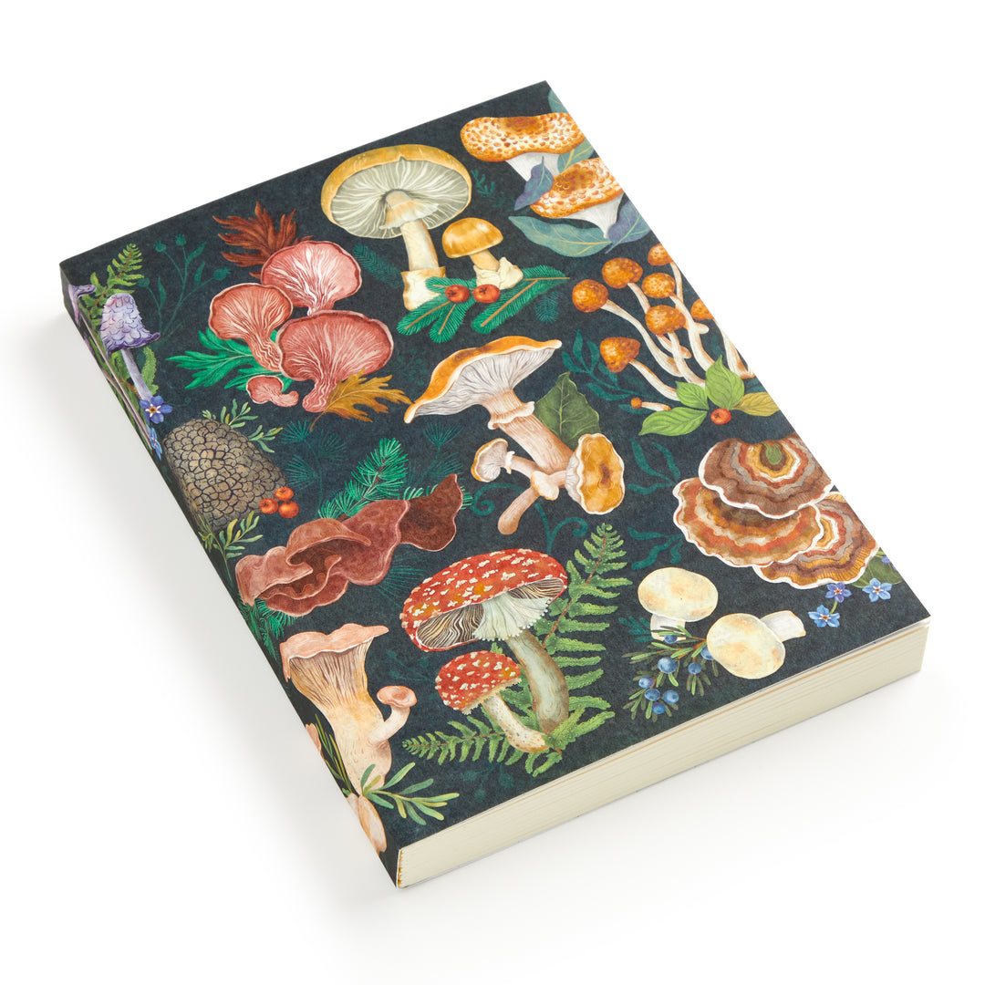 The World of Mushrooms Premium A5 Notebook by Olga Akbarova features a dark cover with vibrant, detailed mushroom and botanical illustrations—an ideal journal for nature enthusiasts.