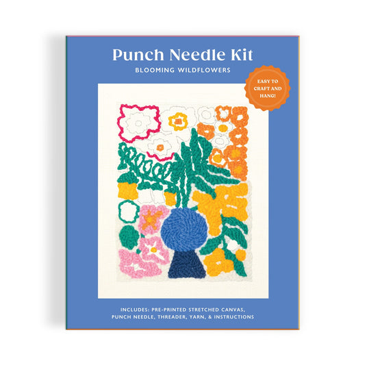 The Liv Lee Blooming Wildflowers Punch Needle Kit features a colorful floral and leaf design in a blue vase, with orange, yellow, green, and pink yarn on a white background.