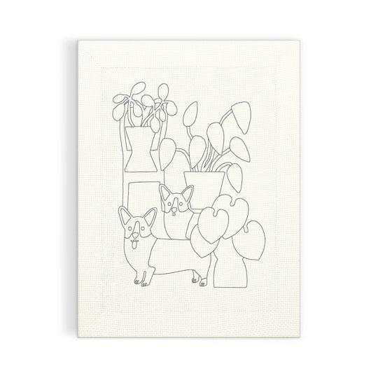 Create your own minimalist art with the Corgi Friends Punch Needle Kit by Anne Bentley, featuring two corgis among leafy potted plants on a textured white canvas.