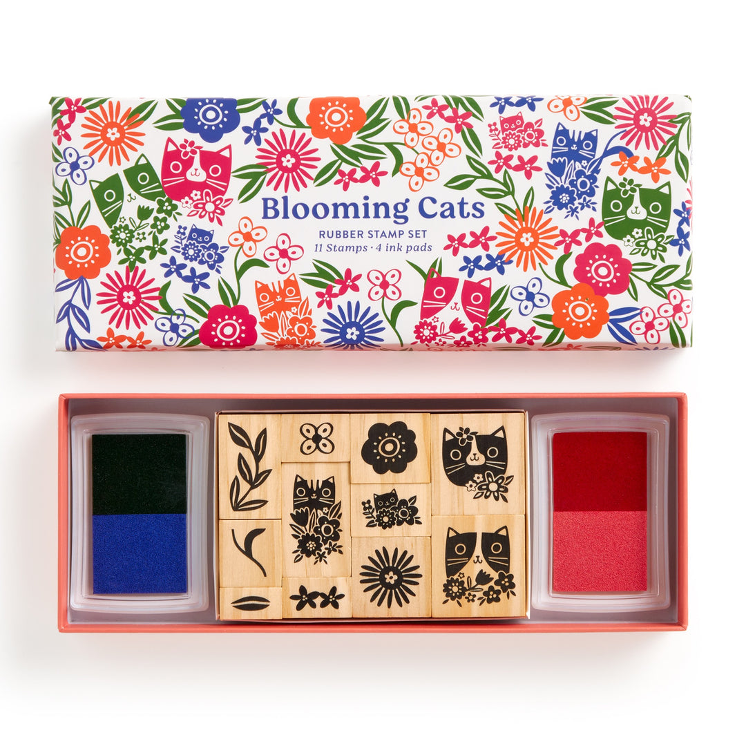 The Tara Lilly Blooming Cats Rubber Stamp Set includes 9 wood stamps with cat and botanical designs, black and red ink pads, all in a boxed set featuring floral motifs on the lid.