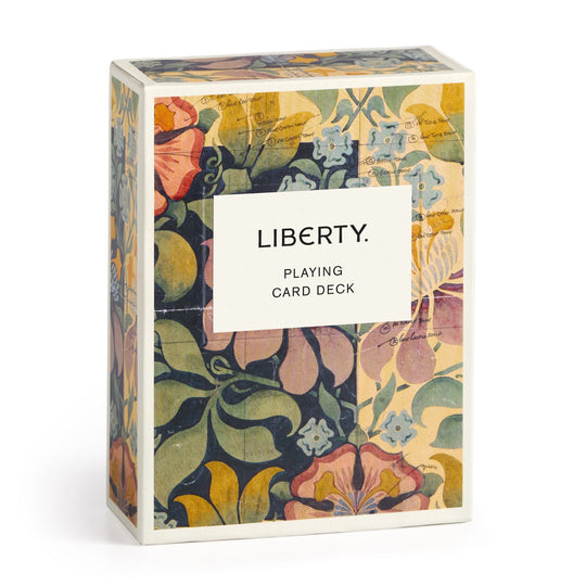 The Liberty Archive Playing Card Deck by Liberty London features a vintage-style floral pattern from the Liberty Archive and a central white label reading LIBERTY. PLAYING CARD DECK.