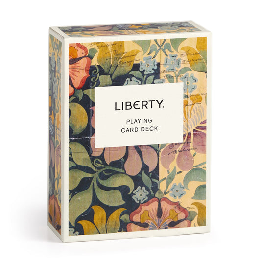 The Liberty Archive Playing Card Deck by Liberty London features a vintage-style floral pattern from the Liberty Archive and a central white label reading LIBERTY. PLAYING CARD DECK.