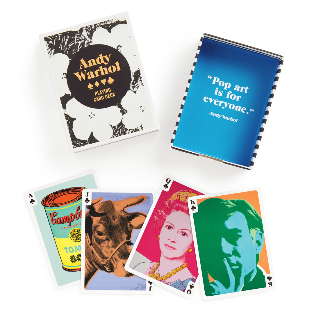 The Warhol Pop Art Playing Card Deck by the Andy Warhol Foundation For The Visual Arts showcases iconic designs like Campbell’s Soup Can, a cow, and vibrant portraits on premium cardstock, plus a quote card.