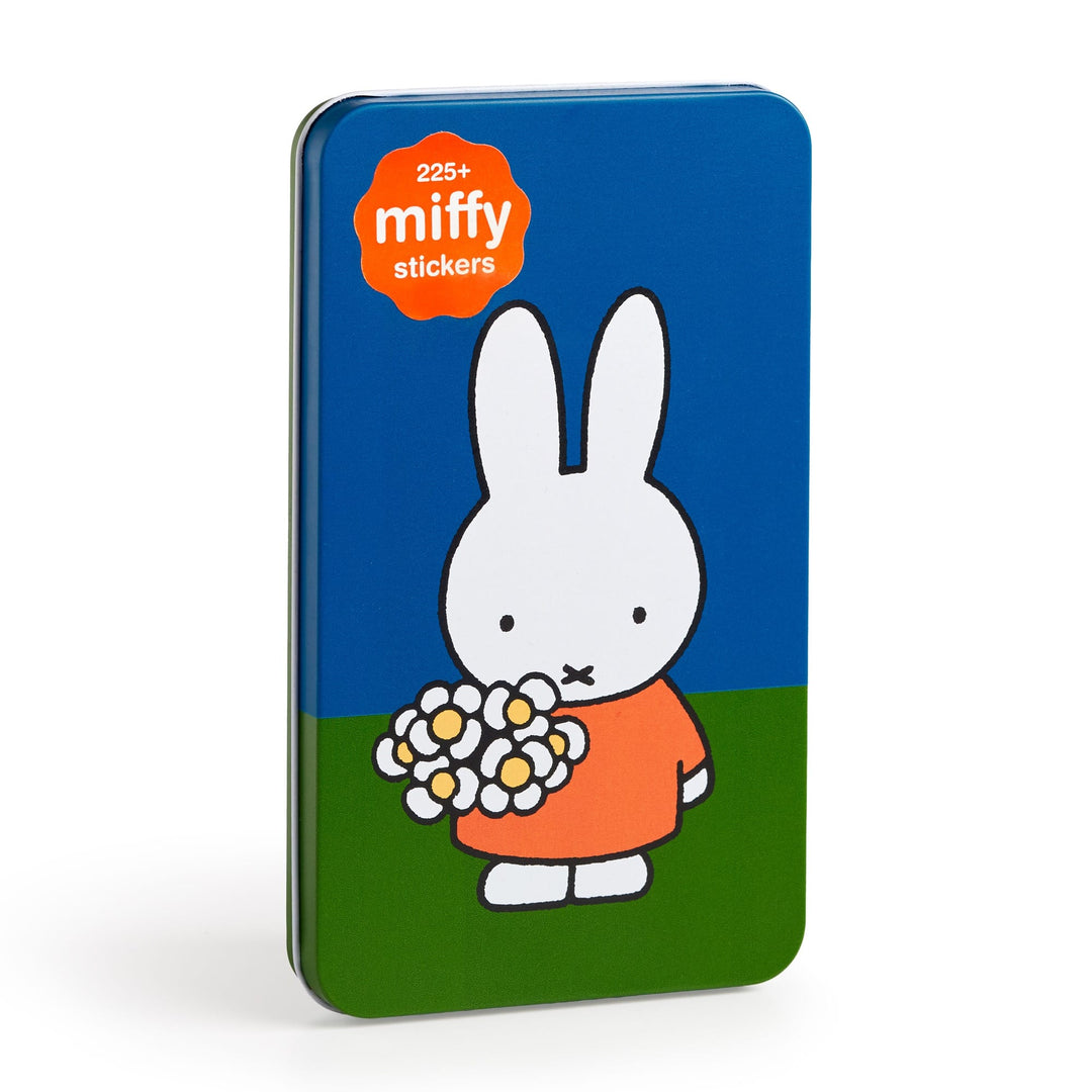 The Miffy Sticker Tin by Miffy features a rectangular design with a cartoon of Miffy holding flowers on a blue and green background, plus an orange label that reads "225+ miffy stickers" in the top left corner.