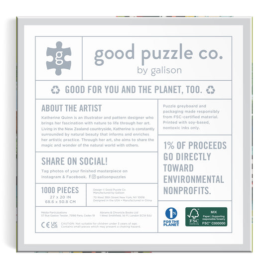 Back of the Good Puzzle Co. Cat Haven 1000 Piece Puzzle box by artist Katherine Quinn—made from recycled materials, encourages sharing on social media, and donates 1% of proceeds to nonprofit organizations.
