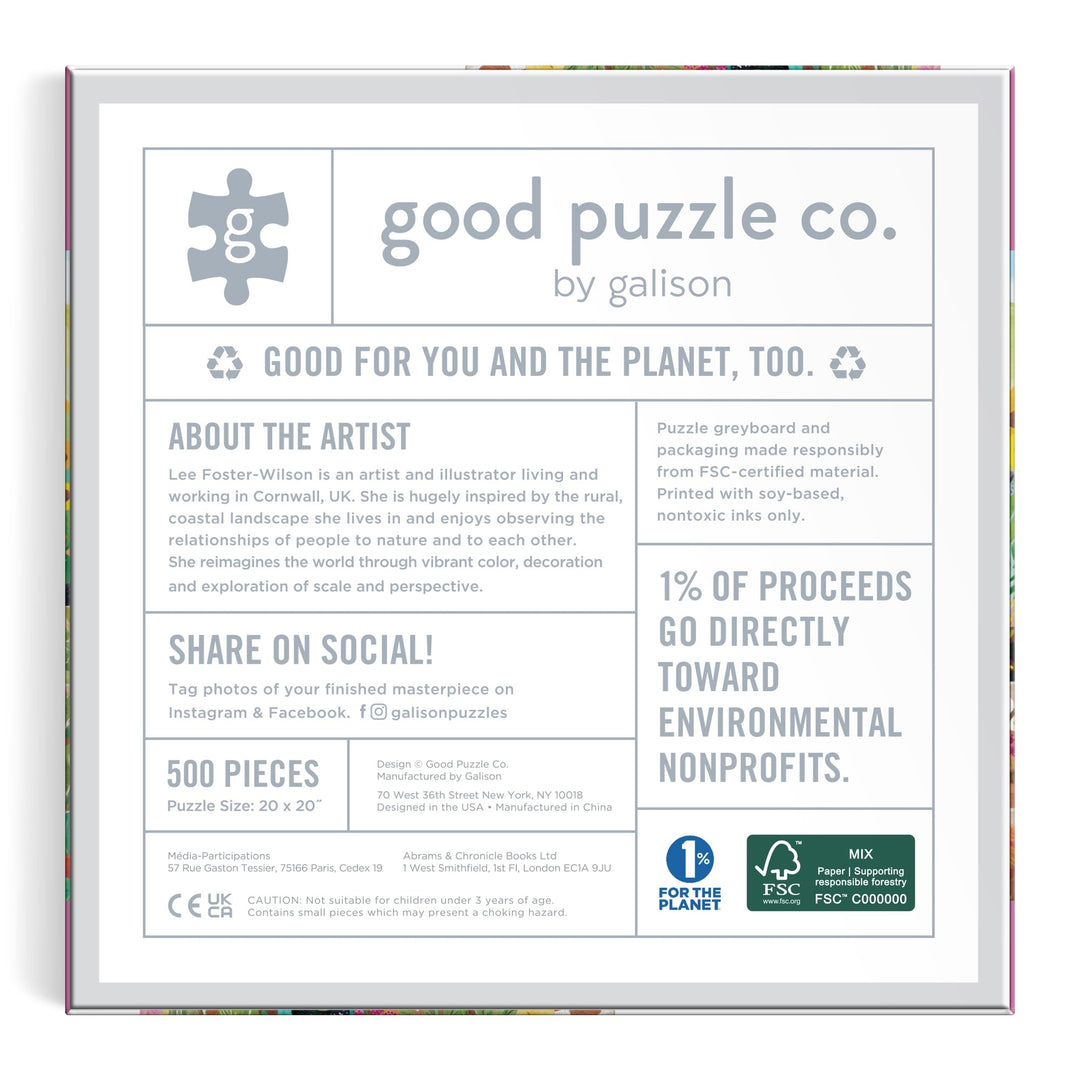 The Good Puzzle Co. Basket Blooms 500pc Puzzle by Lee Foster-Wilson features eco-friendly, recycled packaging, artist info, social media details, and states that 1% of proceeds support environmental nonprofits.