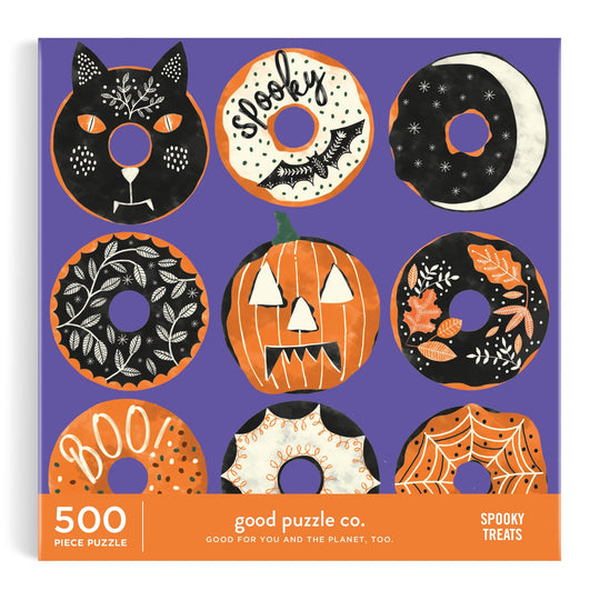The Good Puzzle Co. Spooky Treats 500pc Puzzle by Laura Watkins features nine Halloween-themed donuts on a purple background, crafted from recycled materials for festive and sustainable fun.