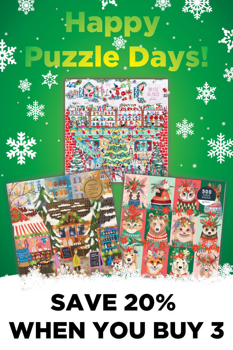 Festive promotional image with three colorful jigsaw puzzles on a green snowy background, text reads “Happy Puzzle Days!” and “Save 20% when you buy 3.”.